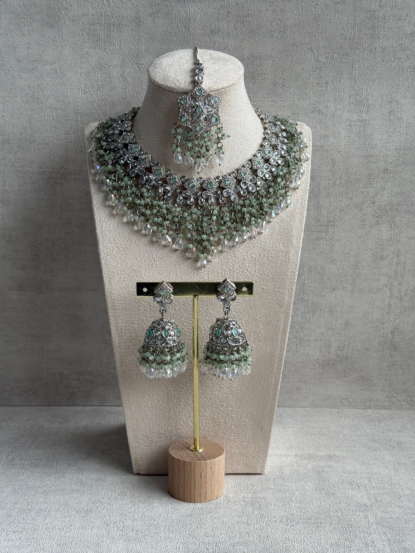 Ayura Designs Rayna Set – Necklace, Jhumkis & Tikka with Mint Green Beads, Mirror-Cut Stones & Silver Finish