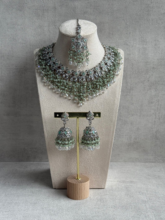 Ayura Designs Rayna Set – Necklace, Jhumkis & Tikka with Mint Green Beads, Mirror-Cut Stones & Silver Finish
