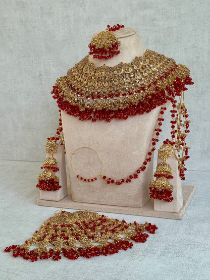 Ayura Designs Ishqiya Bridal Set with Necklace, Jhumkis with Sahare, Tikka & Jhoomer – Antique Gold, Champagne Stones & Red Bead Detailing