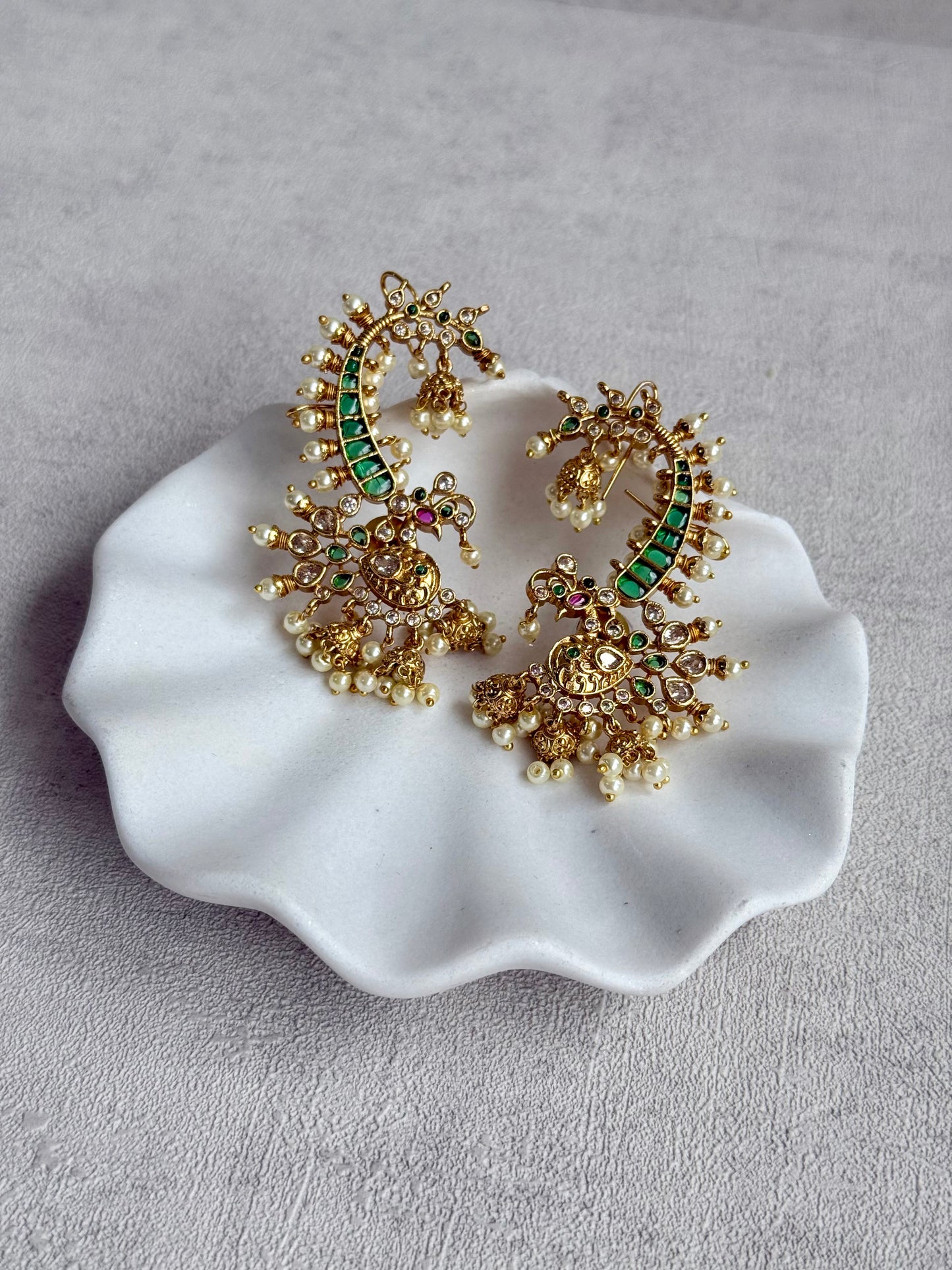 Ayura Designs Megha Half Ear Cuffs – Gold Peacock Motif with Crystal Stones, Emerald & Pink Accents and Pearl Jhumka Drops