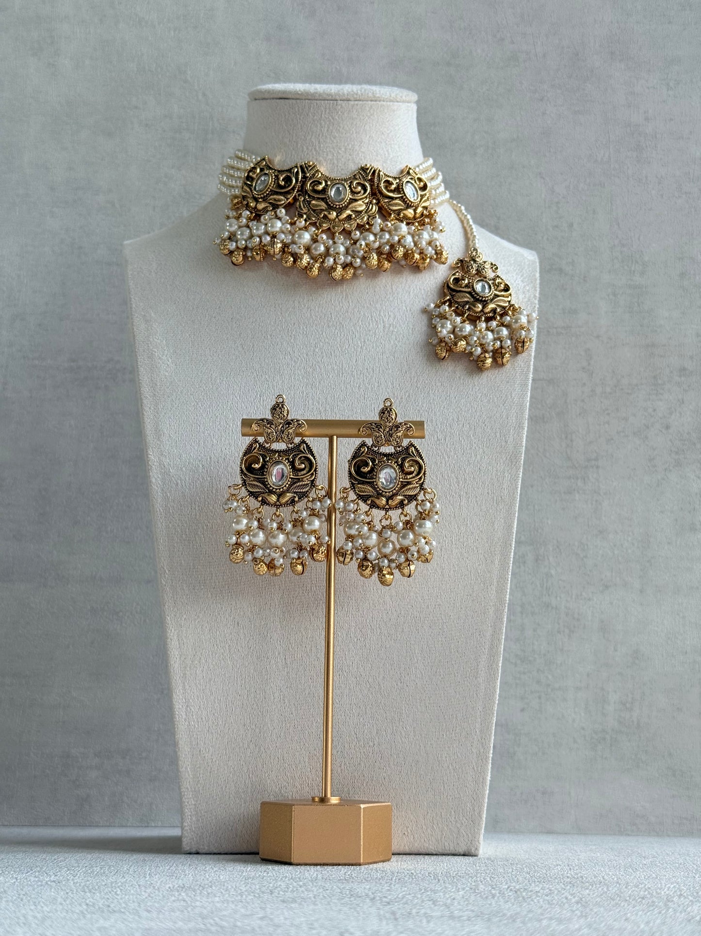 Ayura Designs Sneha Choker Set with Earrings & Tikka – Ivory Beads, Layered Pearl Detailing, Ghungroos & Antique Gold Finish