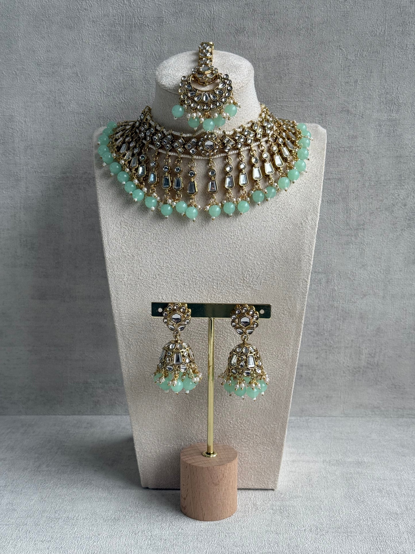 Ayura Designs Shaheen Set with Jhumkis & Tikka – Pistachio Green Beads, Mirror Kundan & Gold Finish