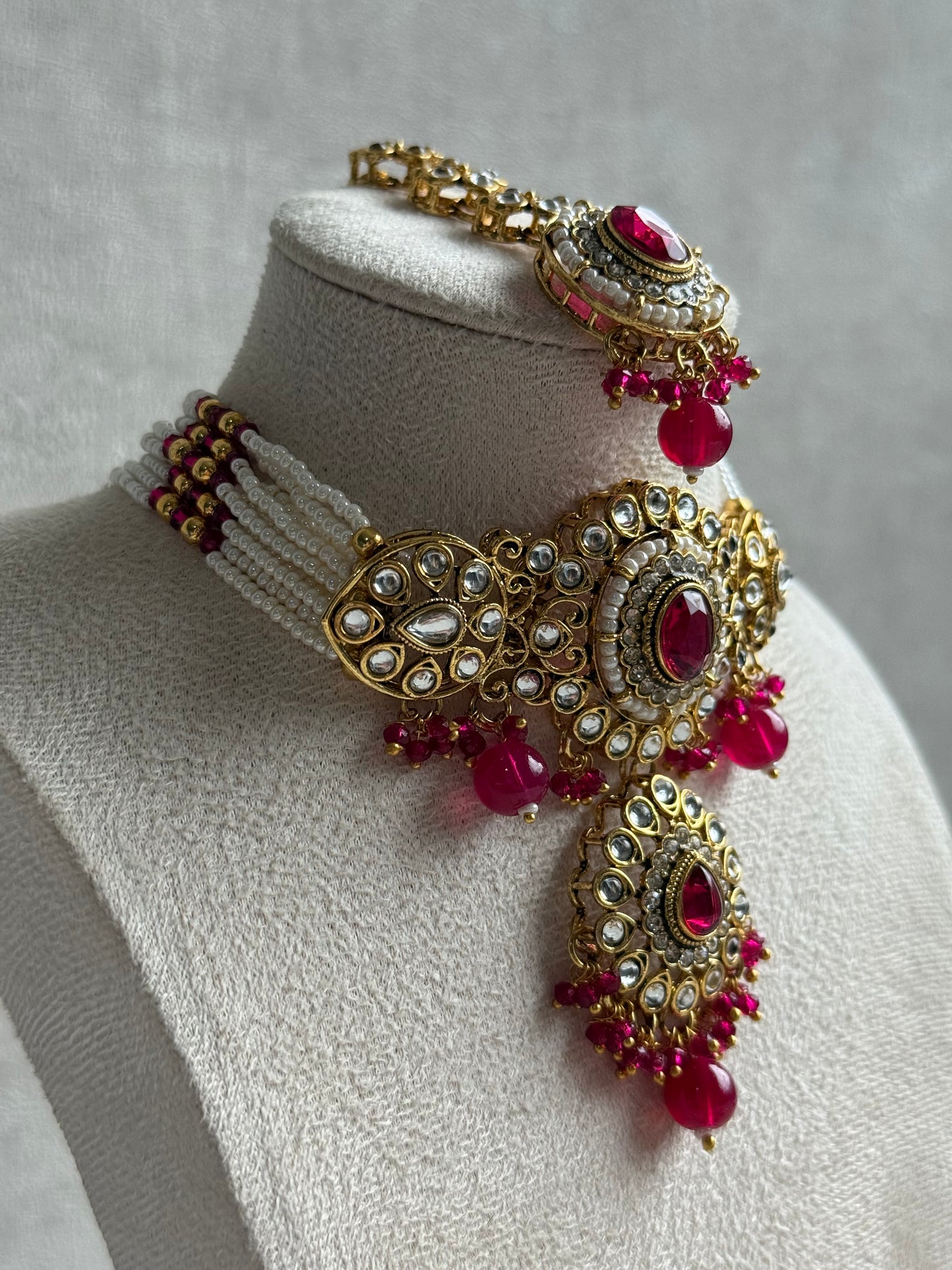 Ayura Designs Muskaan Set – Choker, Jhumkis & Tikka with Fuchsia Beads, Kundan Stones & Antique Gold Finish