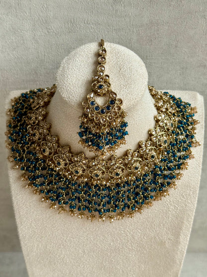 Ayura Designs Mahreen Set – Necklace, Jhumkis & Tikka with Mirror-Cut Stones, Peacock Blue Beads & Gold Finish