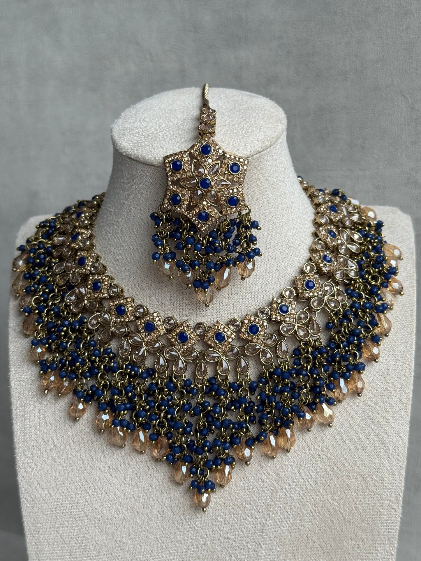 Ayura Designs Rayna Set with Necklace & Tikka – Champagne Crystals, Ink Blue Beads & Antique Gold Finish