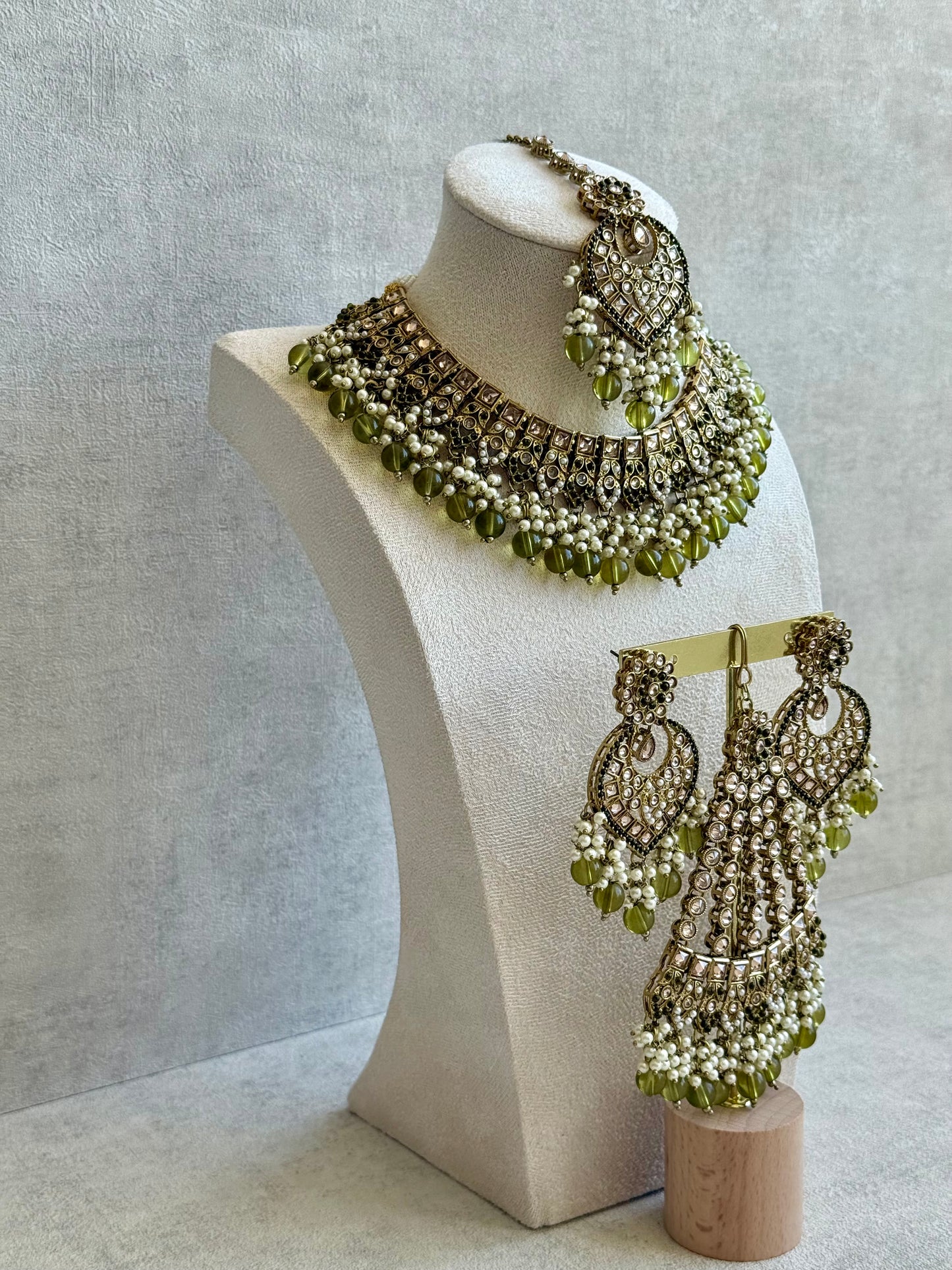 Ayura Designs Sabeen Set with Choker, Jhumkis, Tikka & Jhoomar – Champagne Kundan, Pearl Clusters & Olive Green Beads