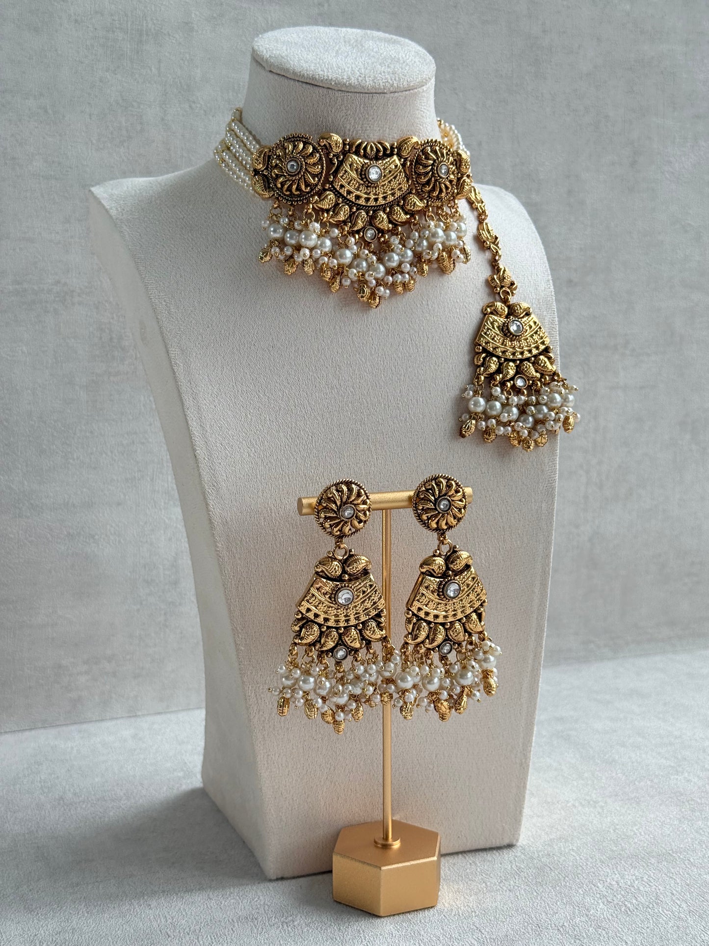 Ayura Designs Sairish Choker Set with Earrings & Tikka – Ivory Beads, Pearl Detailing, Ghungroos, Paisley Motifs & Antique Gold Finish