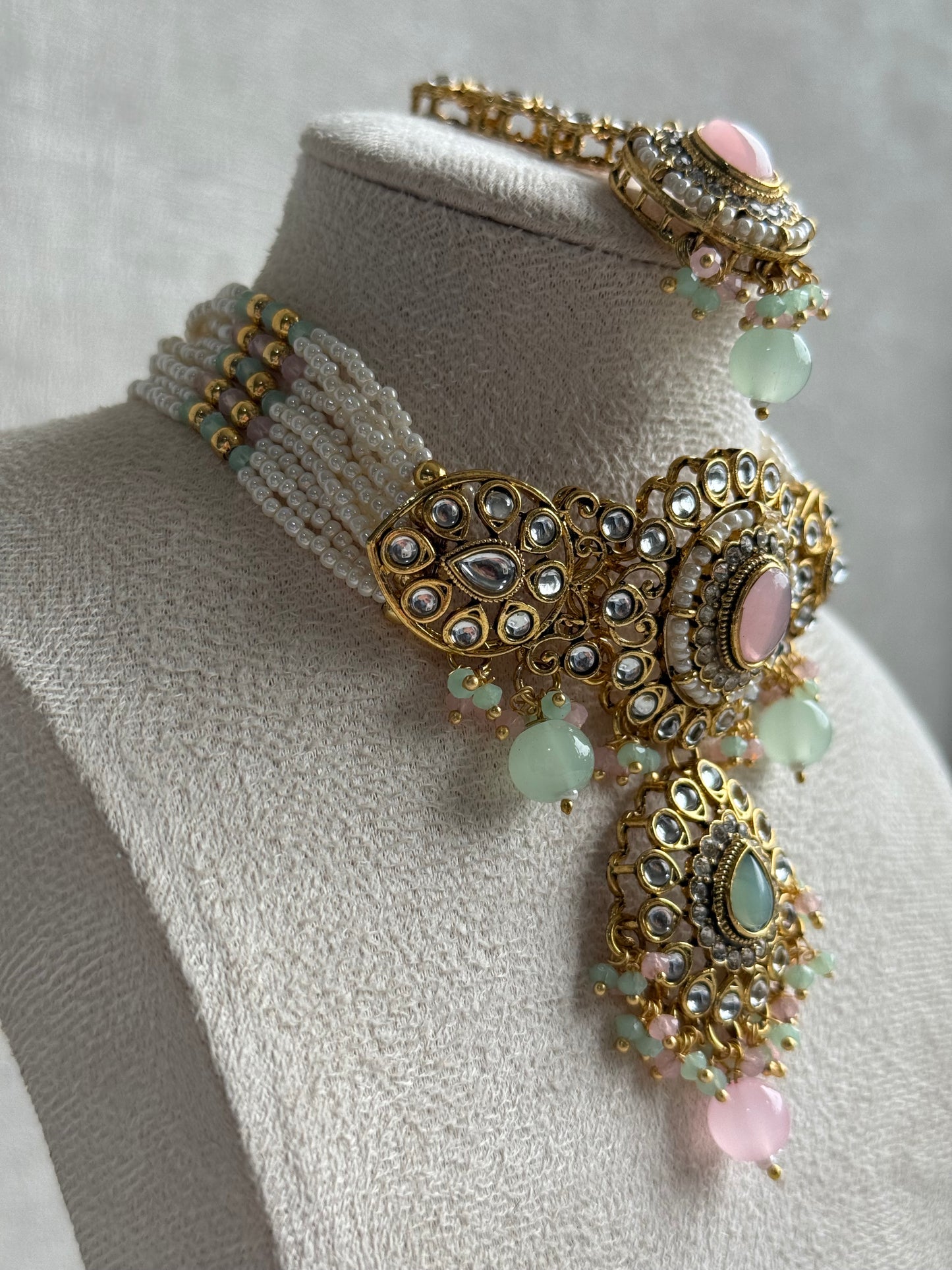 Ayura Designs Muskaan Set – Choker, Jhumkis & Tikka with Blush Pink & Mint Beads, Kundan Stones & Antique Gold Finish