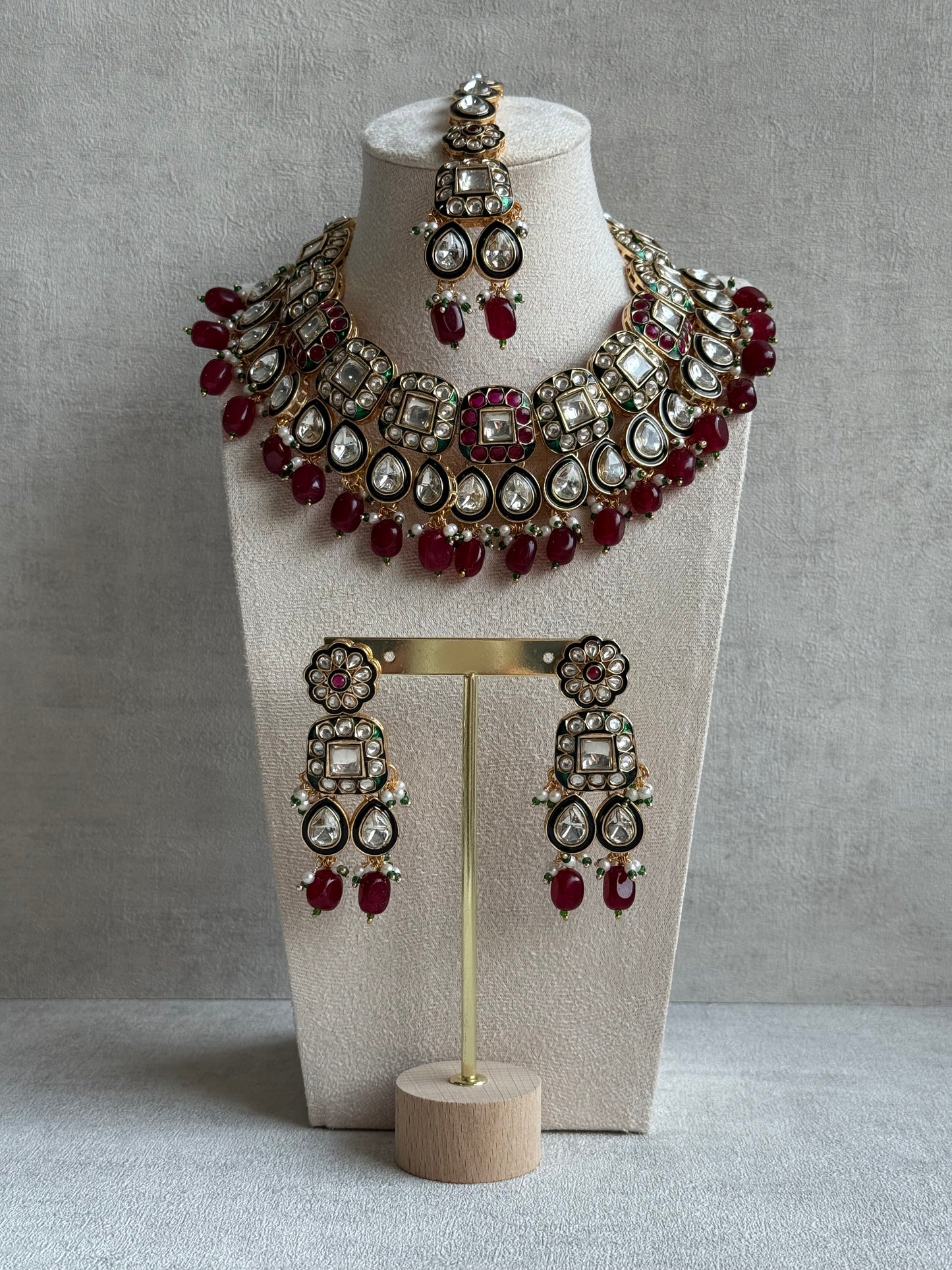 Ayura Designs Salma Set – Necklace, Earrings & Tikka with Mirror-Cut Kundan, Ruby Red Beads, Emerald Green Meenakari & Gold Finish