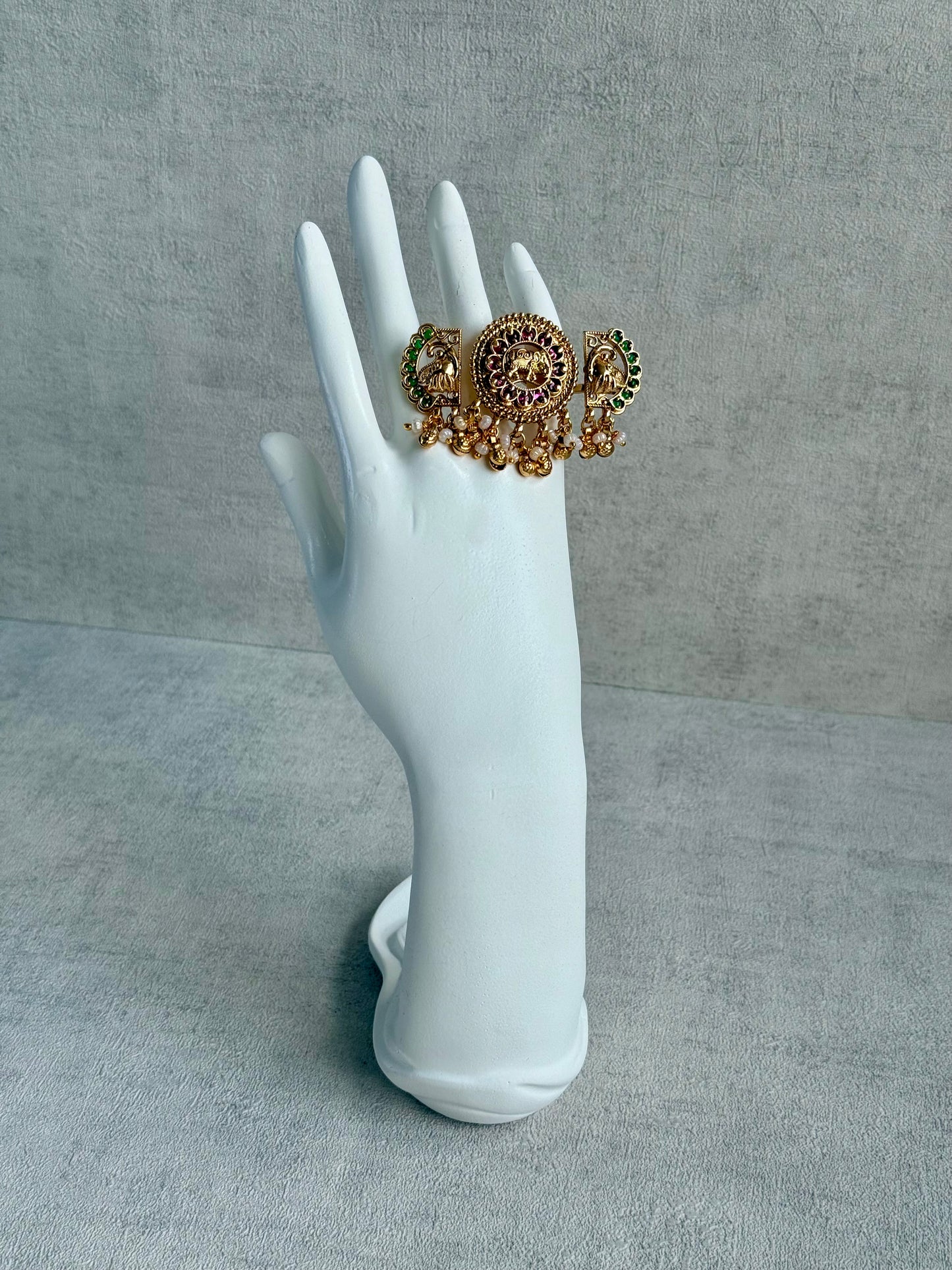 Ayura Designs Nira Adjustable Ring – Jadau-Inspired Gold Elephant Motifs with Rani Pink & Emerald Green Stones, Pearl Drops & Ghungroos