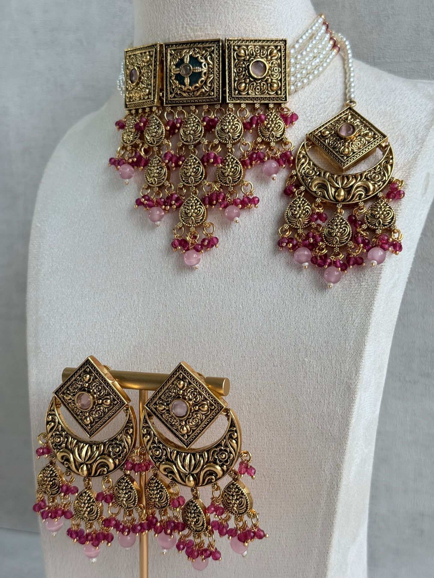 Ayura Designs Samera Choker Set with Earrings & Tikka – Rani Pink & Blush Pink Beads, Green Centre Stone, Floral Motifs & Antique Gold Finish