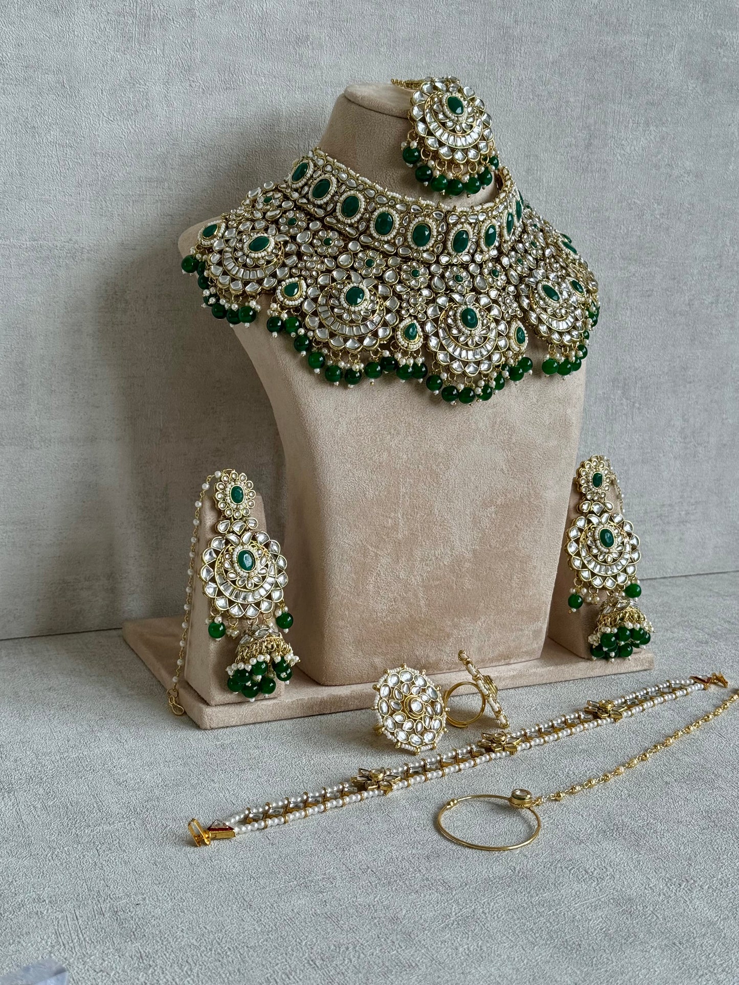 Ayura Designs Meherbano Bridal Set with Necklace, Jhumkis, Tikka, Nath, Ring & Sheeshphool – Jadau Kundan Craftsmanship with Mirror-Cut Polki, Emerald Green Stones & Antique Gold Finish