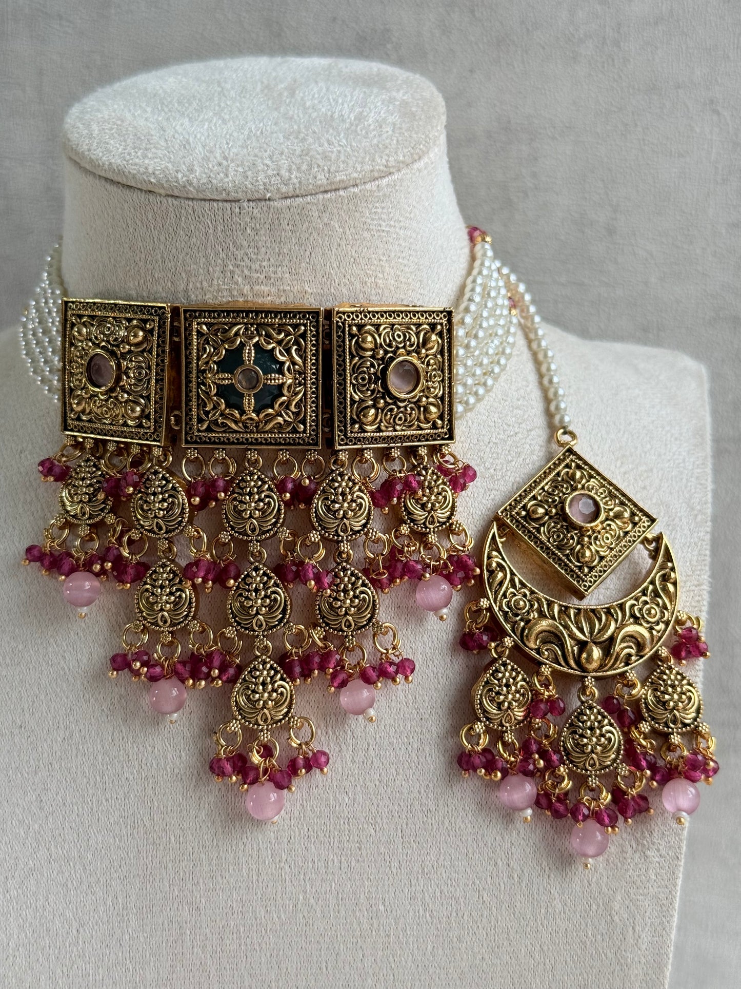 Ayura Designs Samera Choker Set with Earrings & Tikka – Rani Pink & Blush Pink Beads, Green Centre Stone, Floral Motifs & Antique Gold Finish