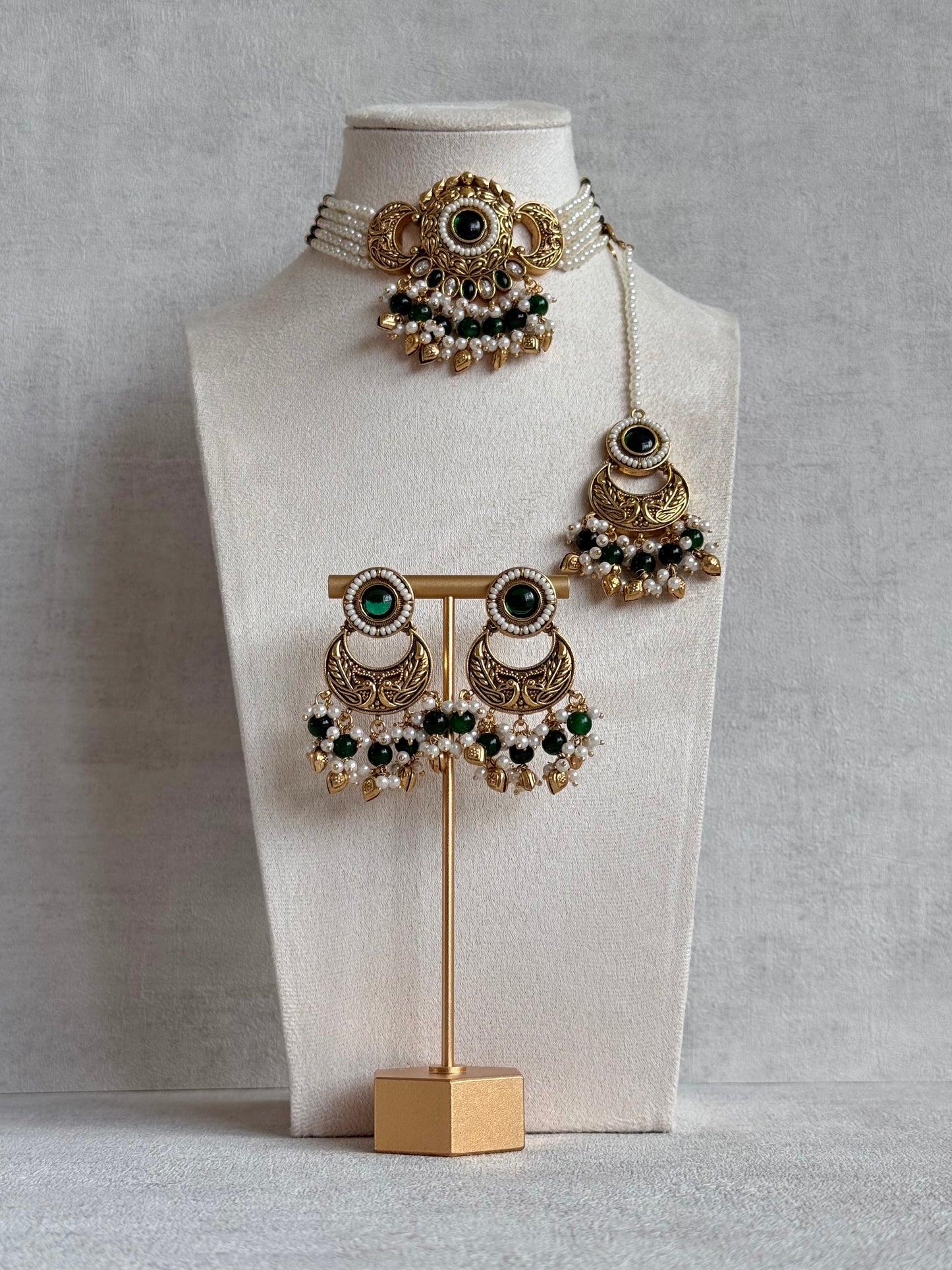 Ayura Designs Mehr Choker Set with Earrings & Tikka – Emerald Green Stones, Pearl Beads, Pearl Strands & Antique Gold Finish