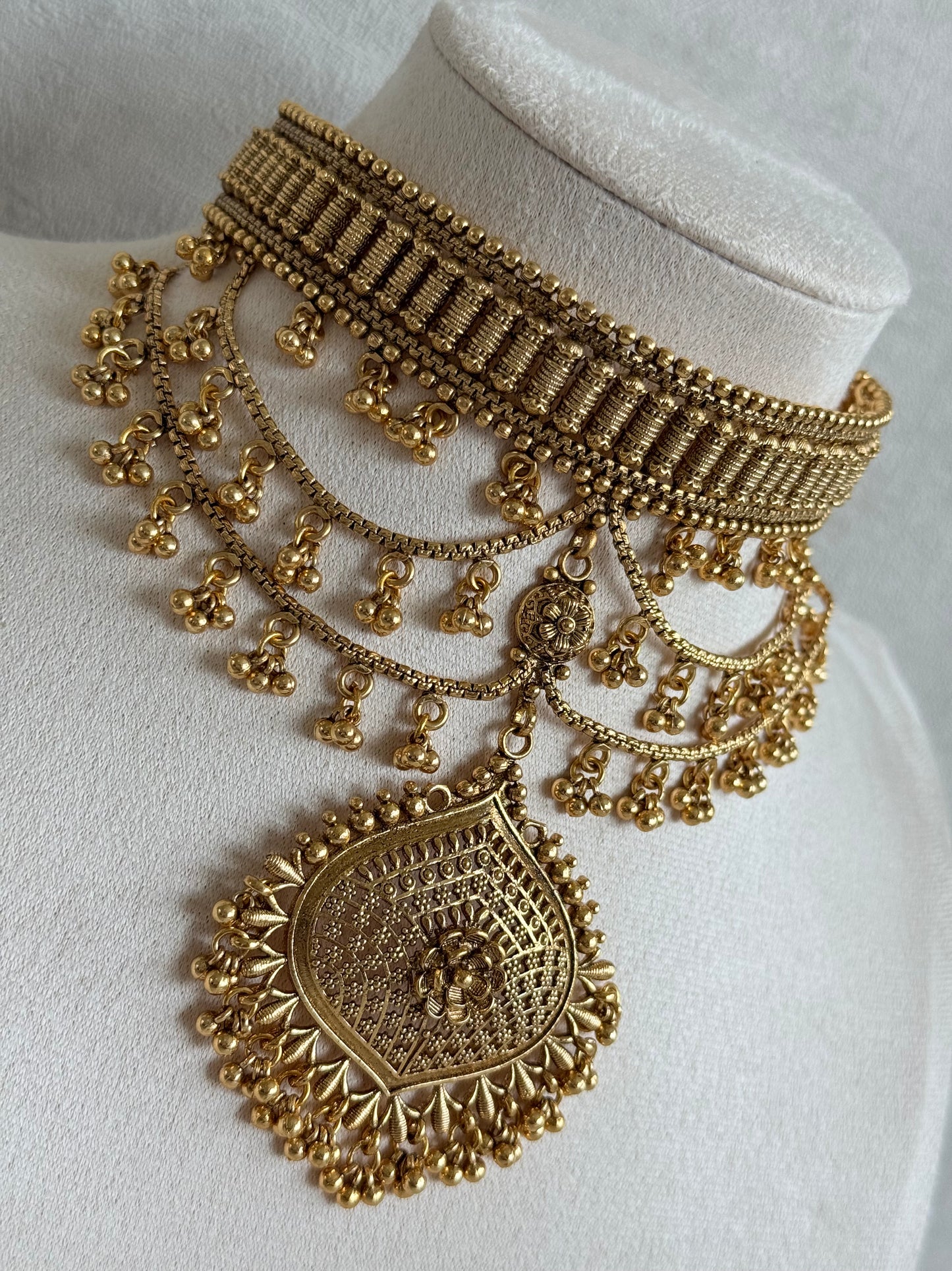 Ayura Designs Sahira Choker Set with Earrings & Tikka – Gold Engraved Choker with Floral Pendant & Ghungroo Detailing
