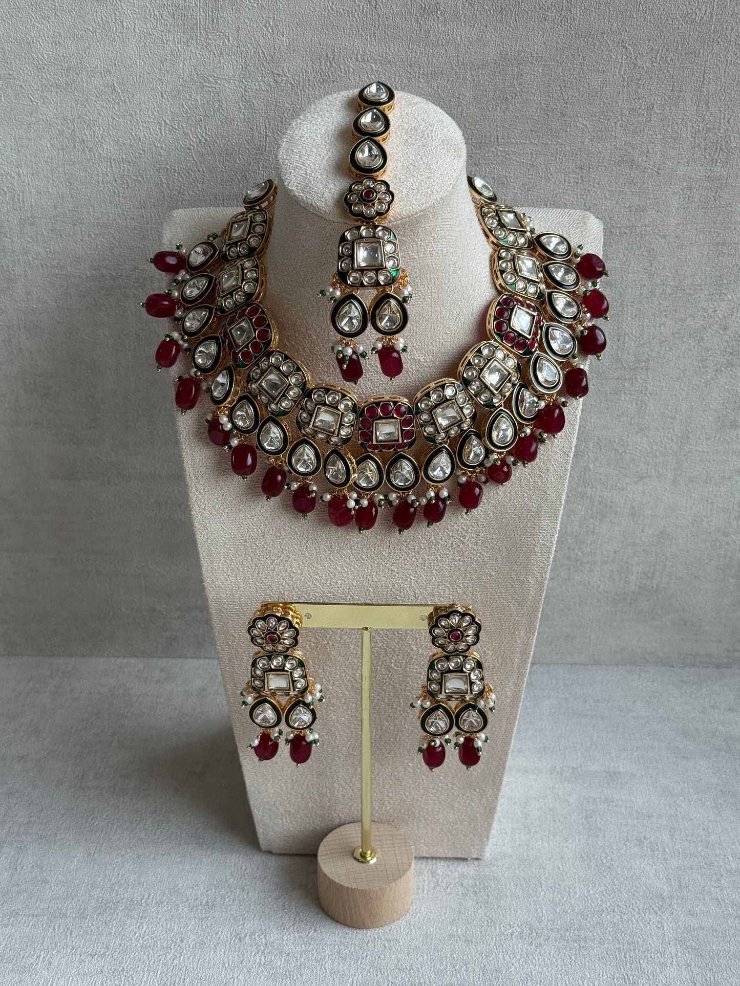 Ayura Designs Salma Set – Necklace, Earrings & Tikka with Mirror-Cut Kundan, Ruby Red Beads, Emerald Green Meenakari & Gold Finish