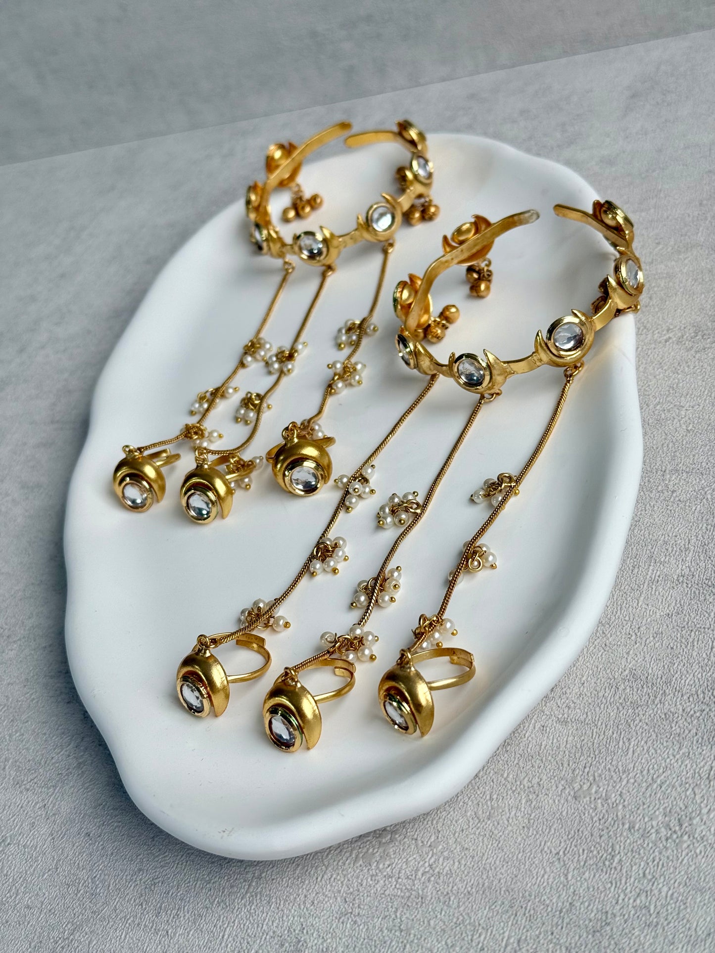 Ayura Designs Chand Haathphool – Antique Gold Hand Harness with Kundan-Style Mirror-Cut Stones & Pearl Detailing