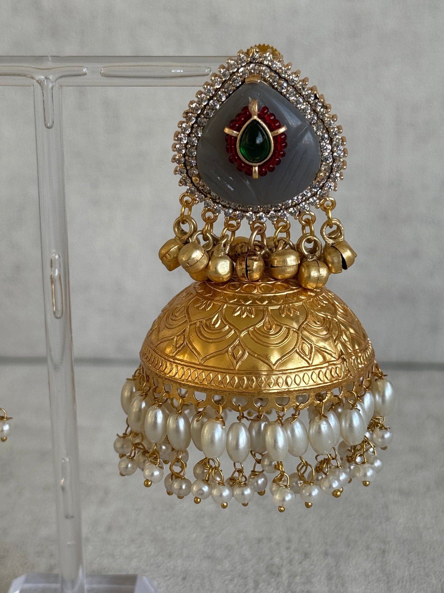 Ayura Designs Ziva Jhumkis – Handcrafted in Antique-Finish Brass with Grey Enamel Studs, Green Stone Detail & Pearl Clusters