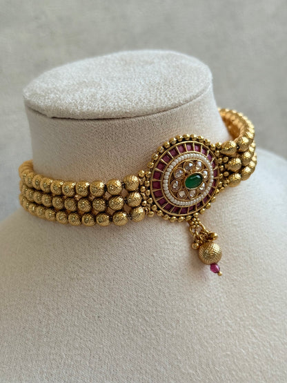 Ayura Designs Kavish Choker Set – Antique Gold Choker with Jhumkis in Rani Pink & Emerald Green with Pearl Detailing