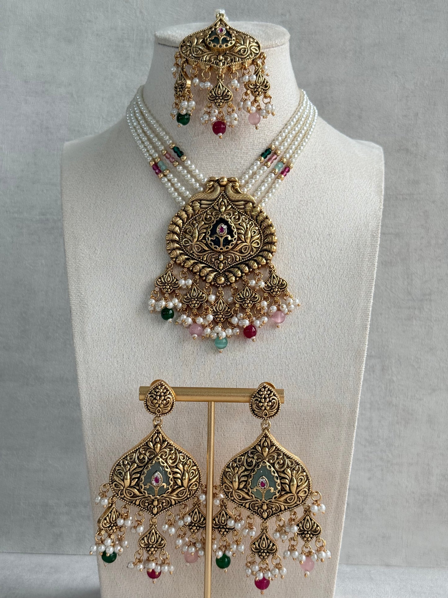 Ayura Designs Afia Necklace Set with Earrings & Tikka – Antique Gold, Multicolour Beads, Green Centre Stone & Peacock Motifs