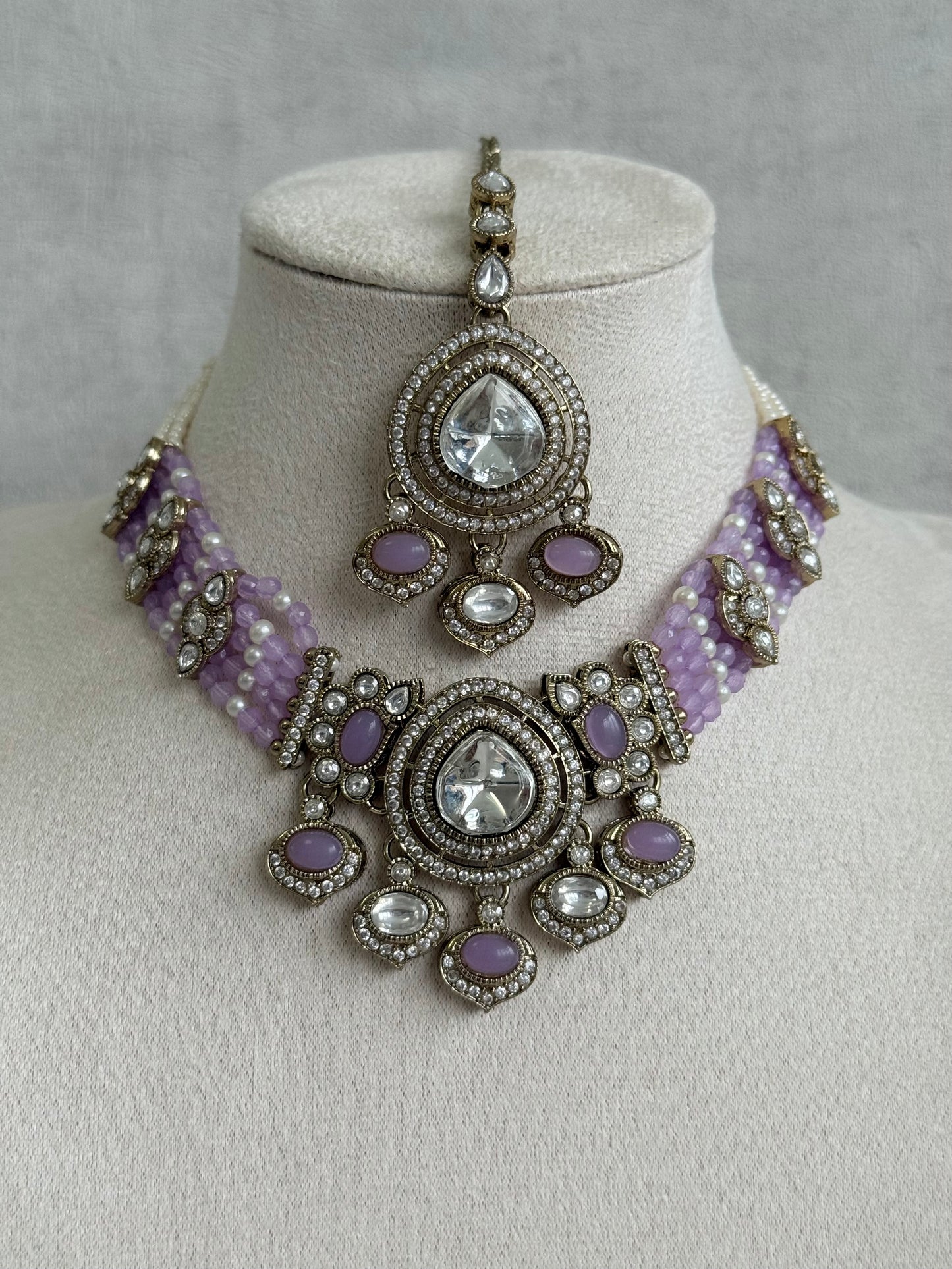 Ayura Designs Rahi Necklace Set with Earrings & Tikka – Lilac Stones with Mirror-Cut Detailing & Pearl Strands