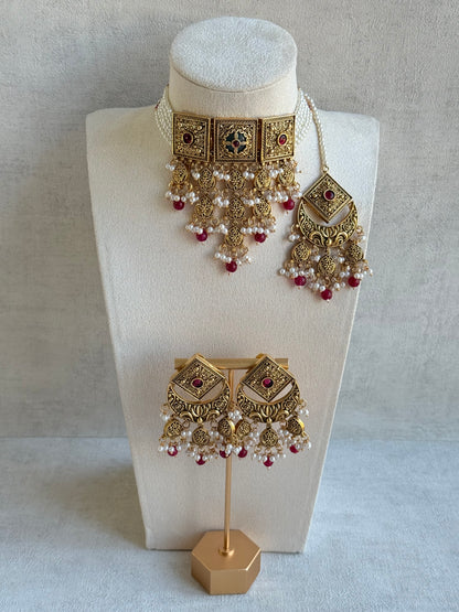 Ayura Designs Samera Choker Set with Earrings & Tikka – Rani Pink Beads, Pearl Detailing, Green Centre Stone, Floral Motifs & Antique Gold Finish