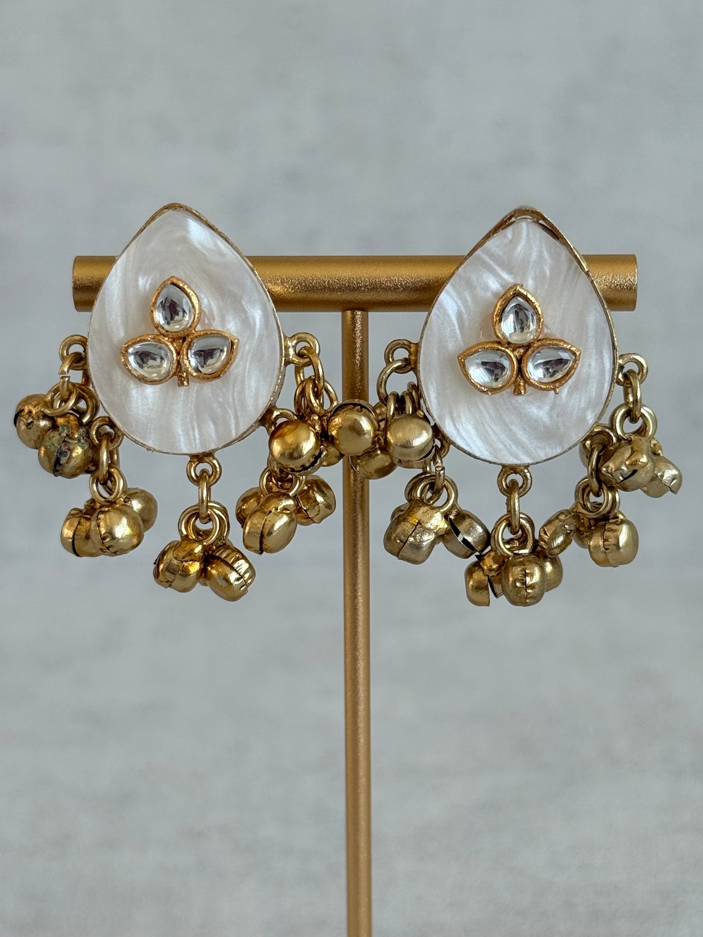 Ayura Designs Aykai Earrings – White Carved Teardrop Stud Earrings with Clear Kundan Stones and Gold Ghungroo Drops