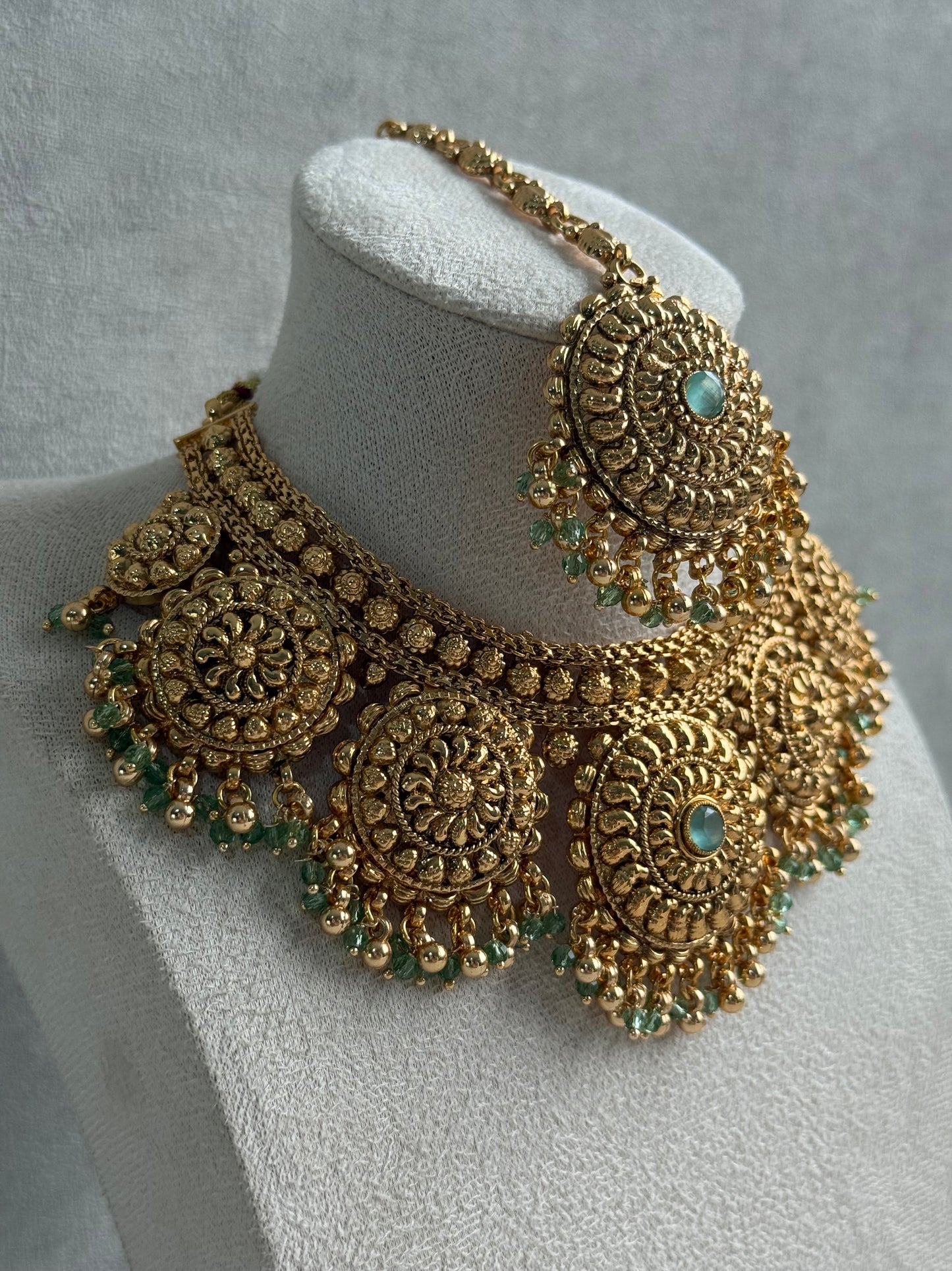 Ayura Designs Rummy Set – Statement Necklace, Earrings & Tikka with Pistachio Green Beads and Polished Gold Finish