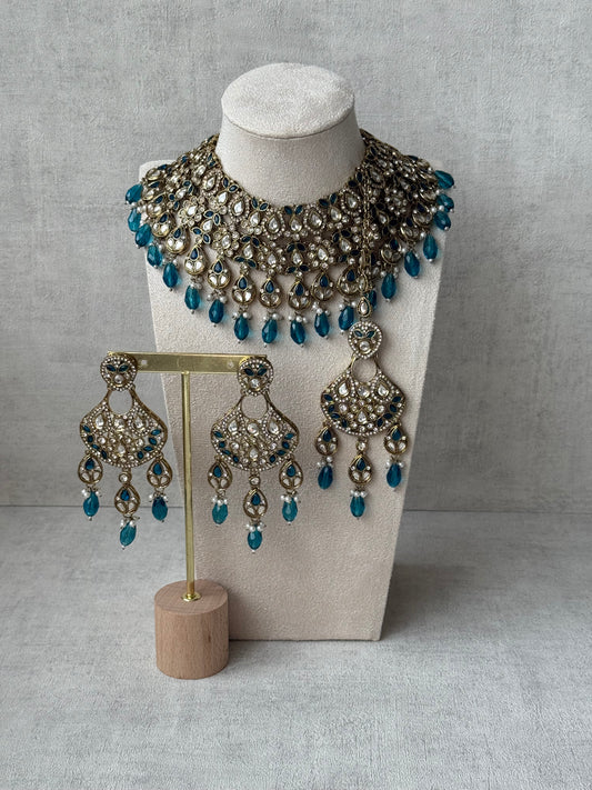 Ayura Designs Hoorain Set with Earrings – Antique Gold Finish, Mirror-Cut Stones & Peacock Blue Beads