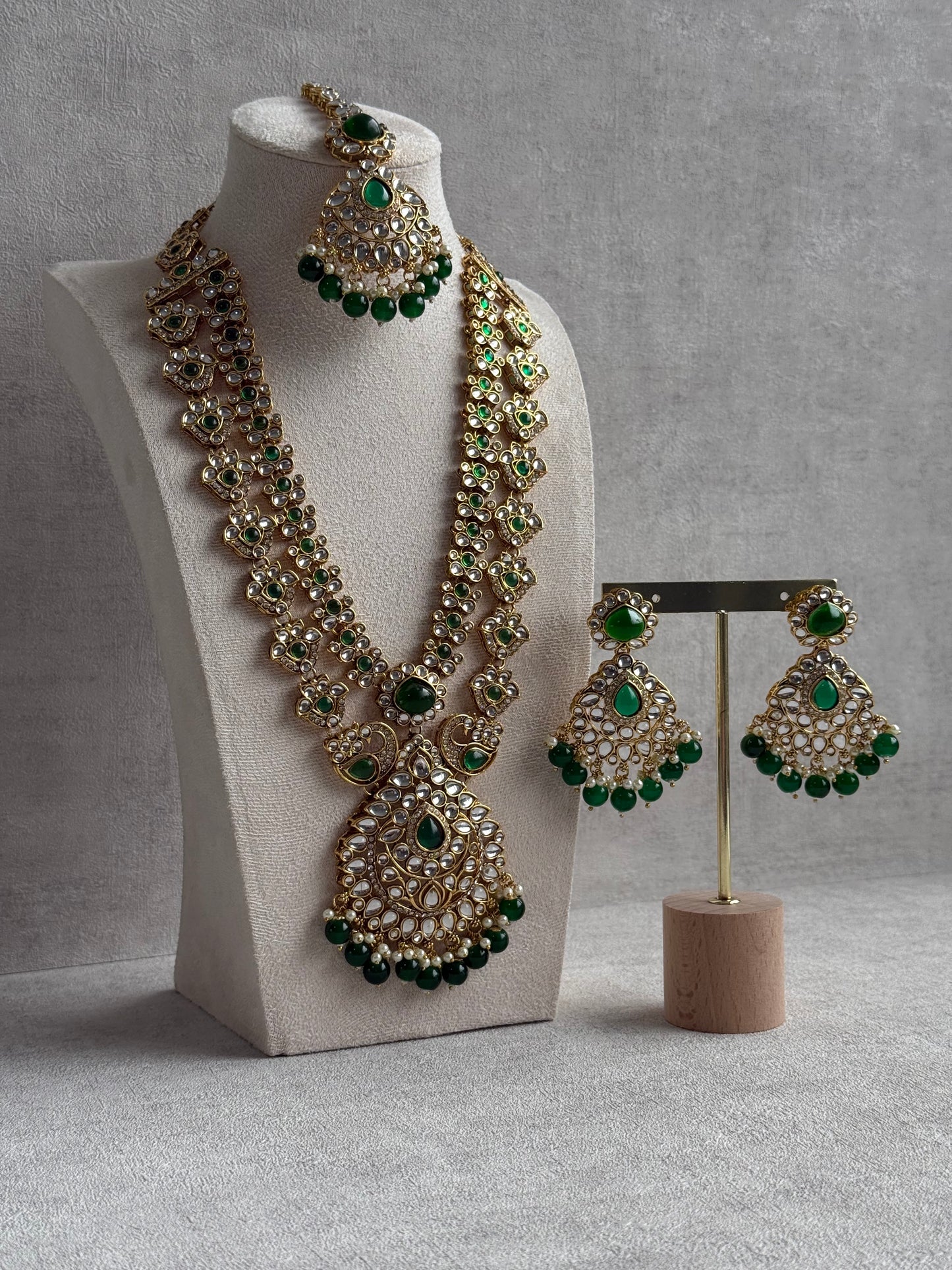 Ayura Designs Javeria Set with Earrings & Tikka – Emerald Green Stones, Mirror Kundan & Gold Finish
