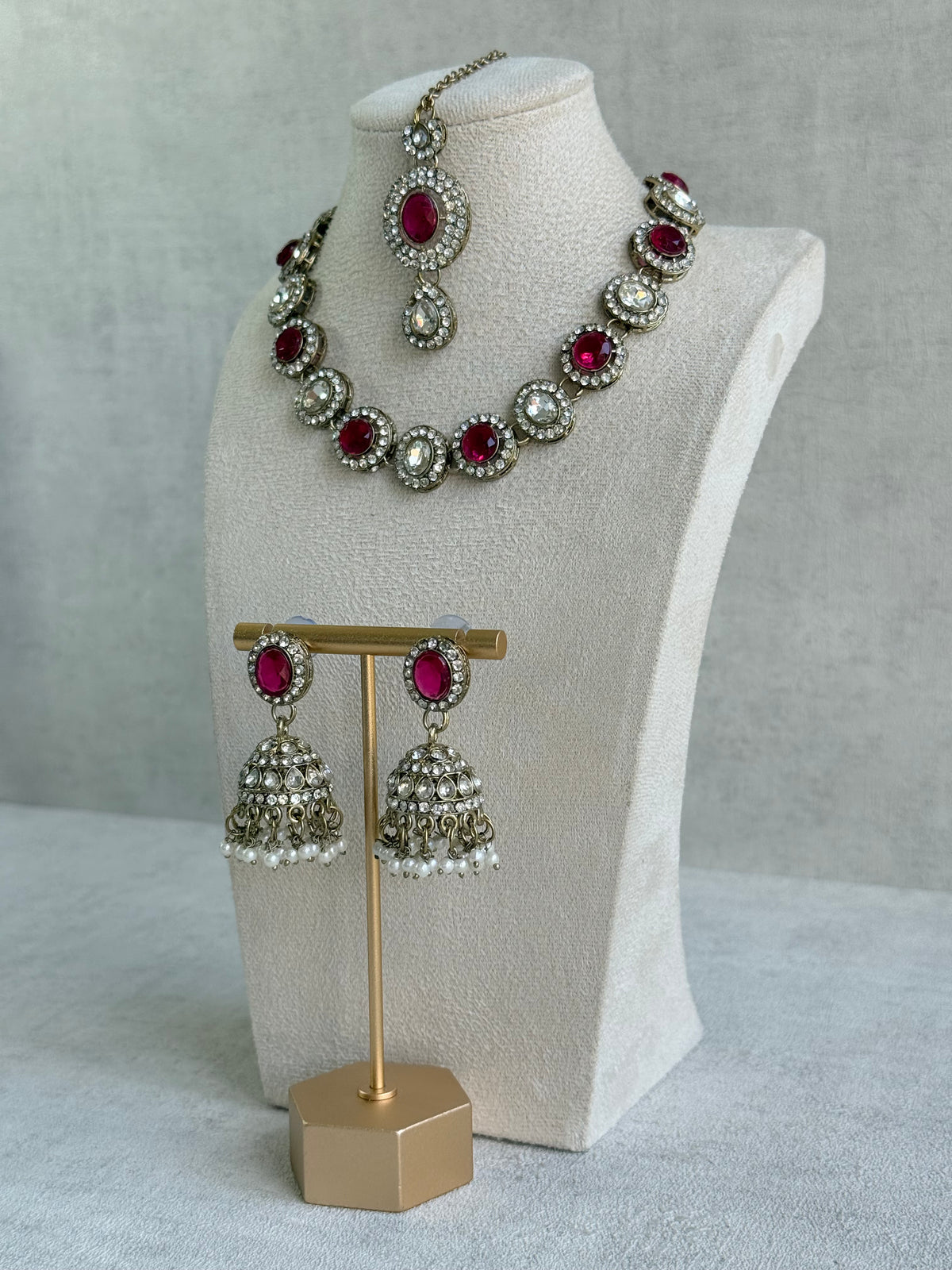 Ayura Designs Eira Necklace Set with Earrings & Tikka – Rani Pink & Crystal Stones with Antique Gold Finish