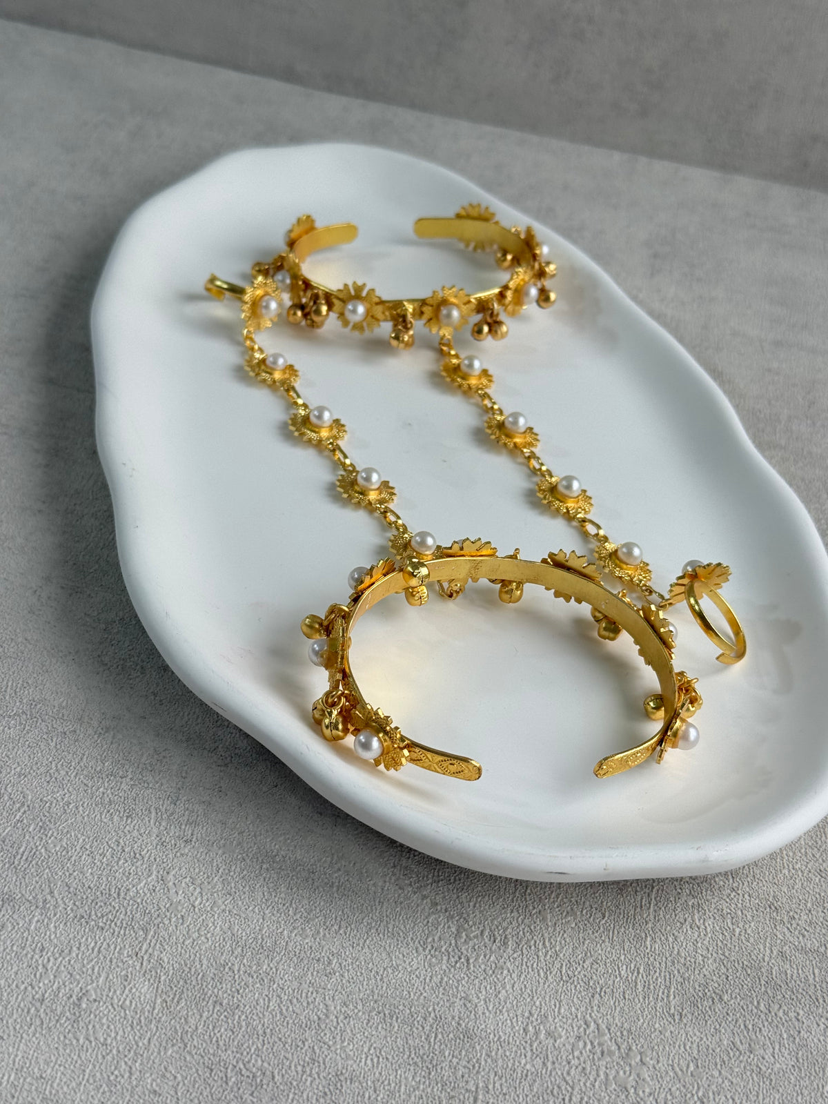 Ayura Designs Avanti Haathphool Set of 2 – Gold Finish Floral Hand Harness with Ivory Pearls & Ghungroo Detailing