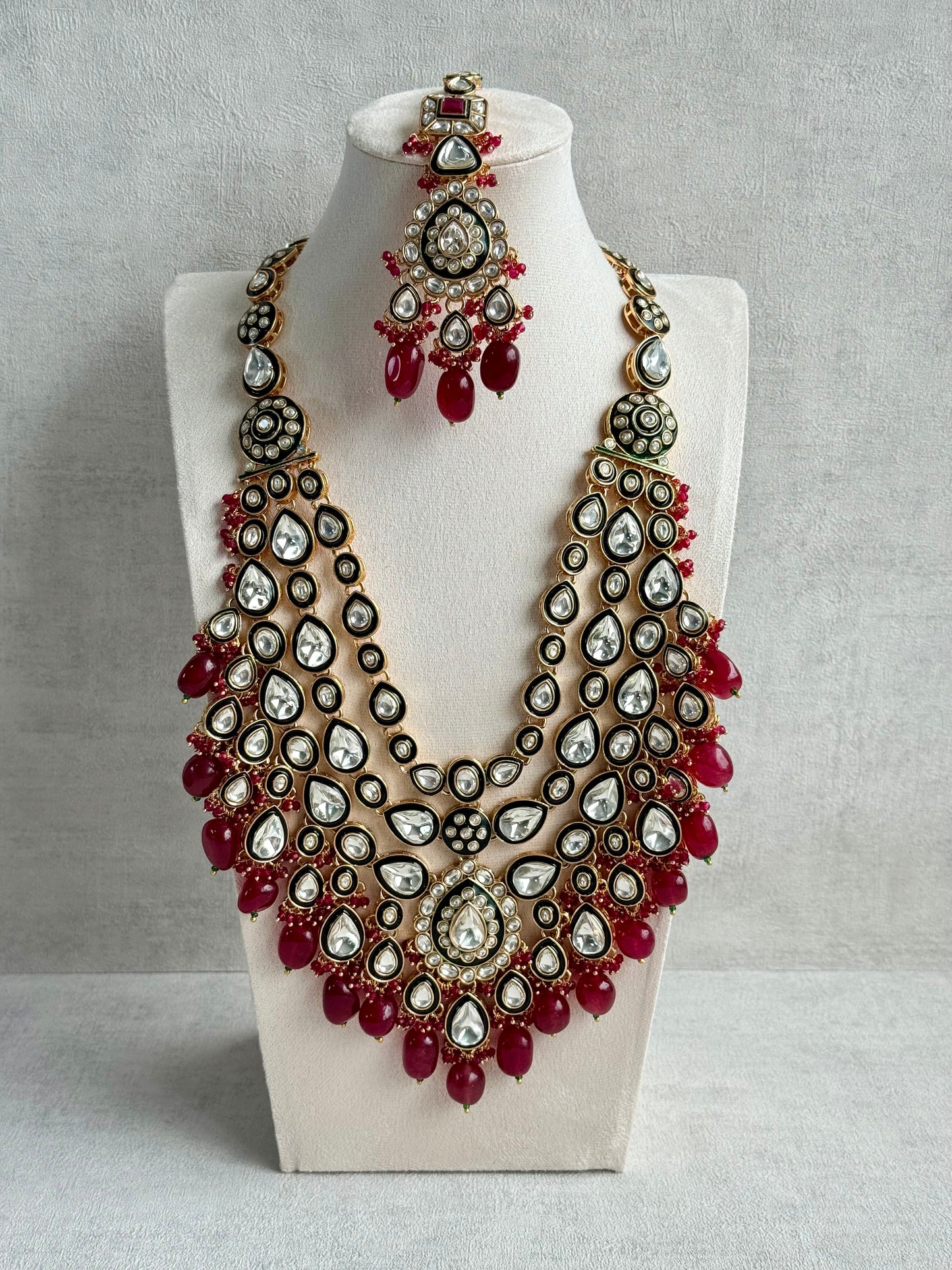 Ayura Designs Zahira Bridal Set with Necklace, Earrings & Tikka – Kundan Detailing with Green Enamel, Ruby Pink Stones & Maroon Bead Drops