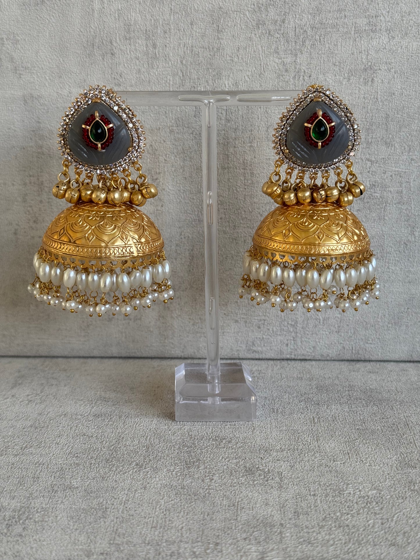 Ayura Designs Ziva Jhumkis – Handcrafted in Antique-Finish Brass with Grey Enamel Studs, Green Stone Detail & Pearl Clusters