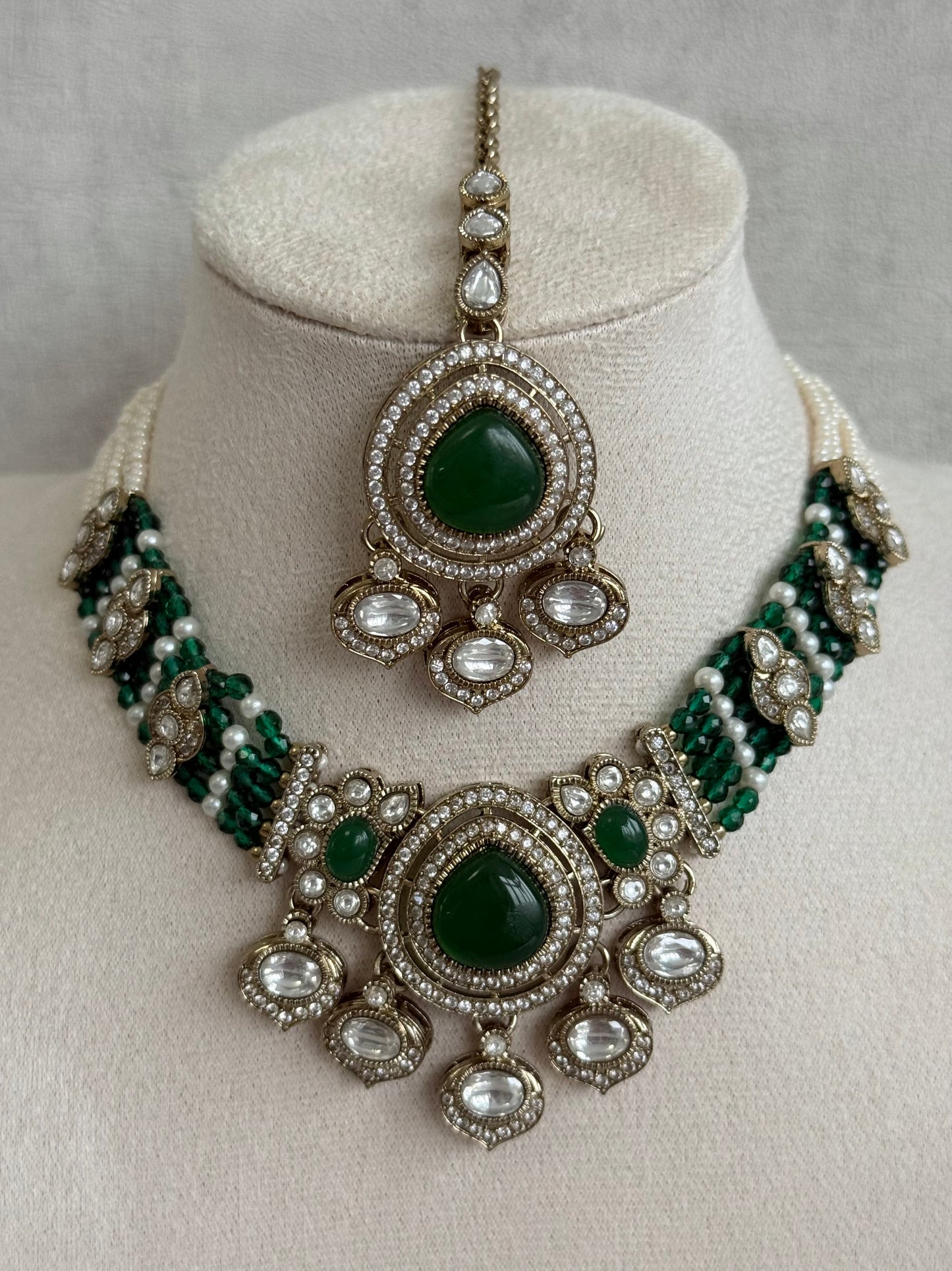 Ayura Designs Rahi Necklace Set with Earrings & Tikka – Emerald Green Stones with Mirror-Cut Detailing & Pearl Strands