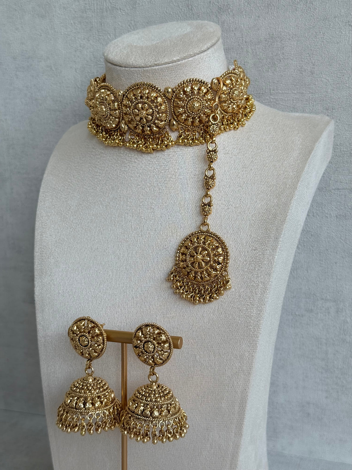 Ayura Designs Nawabi Choker Set with Jhumkis & Tikka – Traditional Gold Tone Bridal Choker with Floral Motifs & Ghungroo Detailing