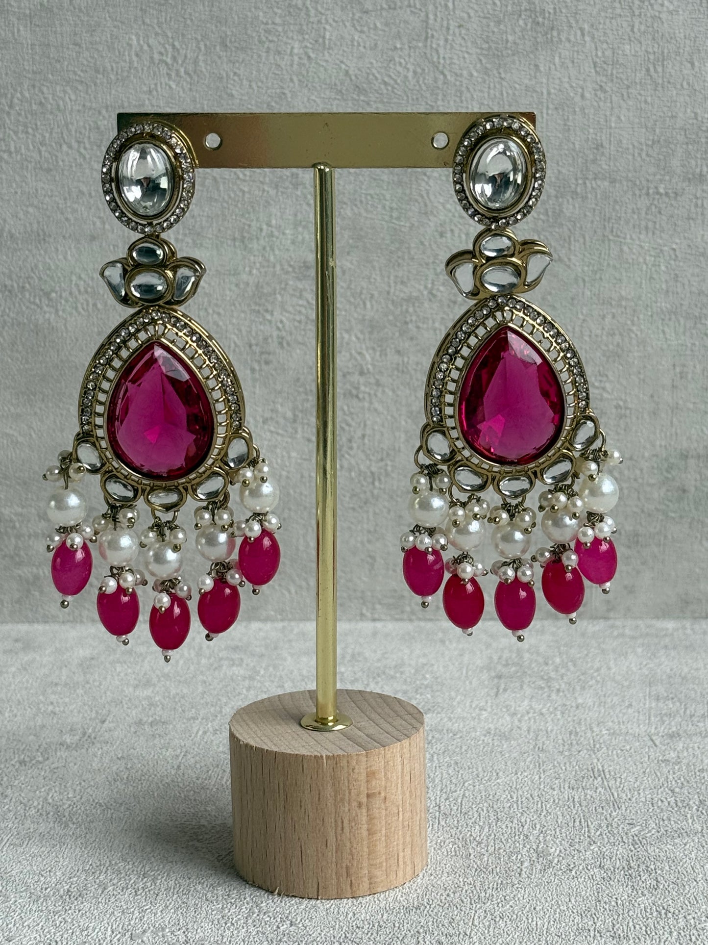 Ayura Designs Nageen Earrings – Antique Gold Jhumkis with Hot Pink Stones, Mirror-Cut Accents & Pearl Drops