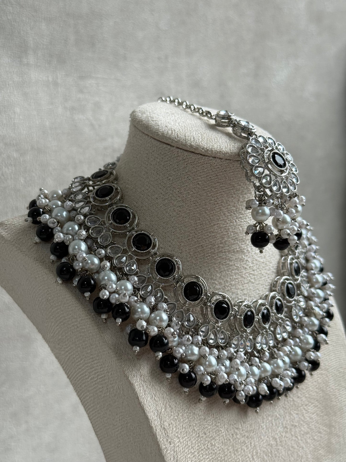 Ayura Designs Barira Set – Necklace, Jhumkis & Tikka with Black Stones, Pearls & Antique Silver Finish