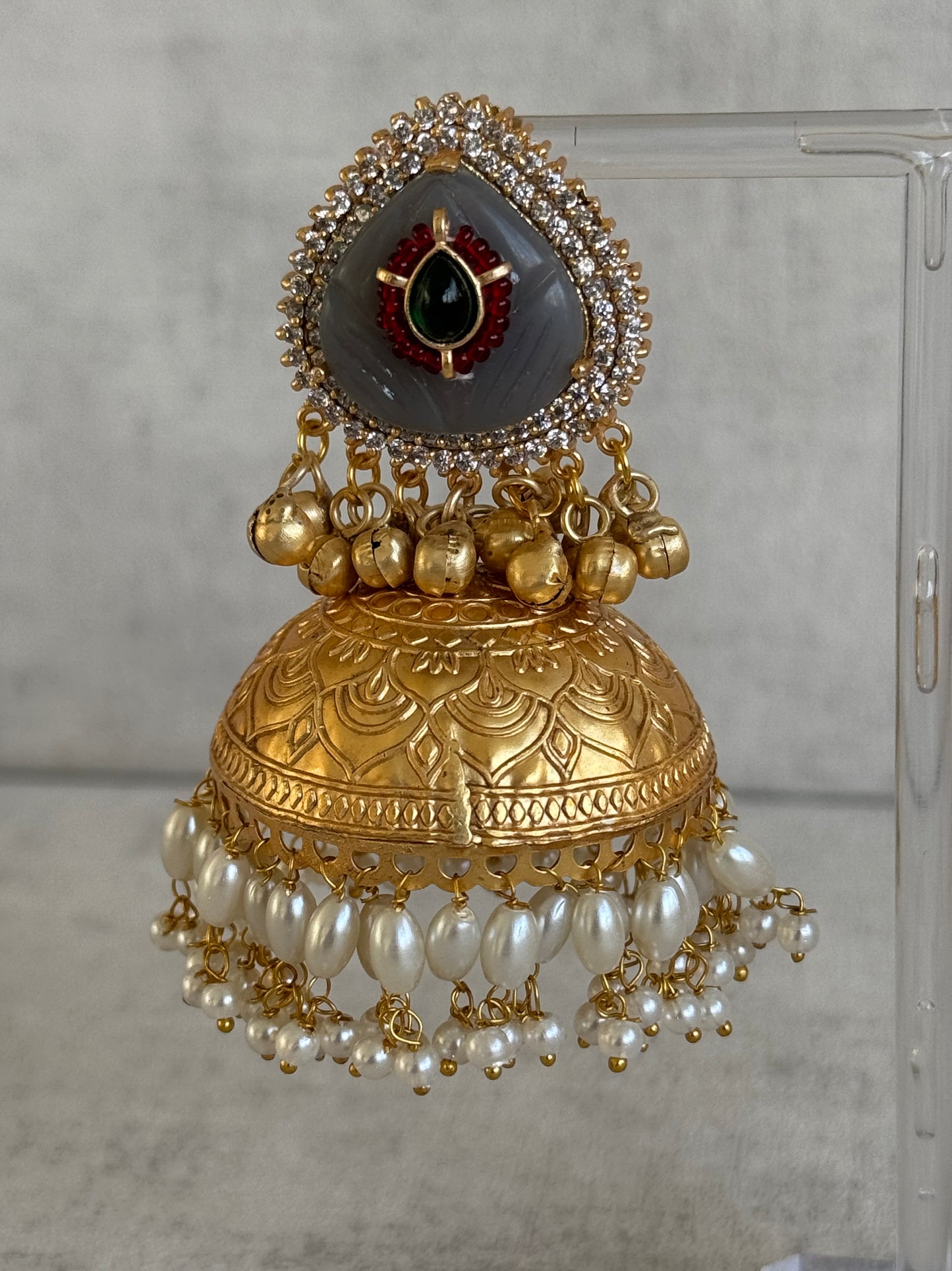 Ayura Designs Ziva Jhumkis – Handcrafted in Antique-Finish Brass with Grey Enamel Studs, Green Stone Detail & Pearl Clusters
