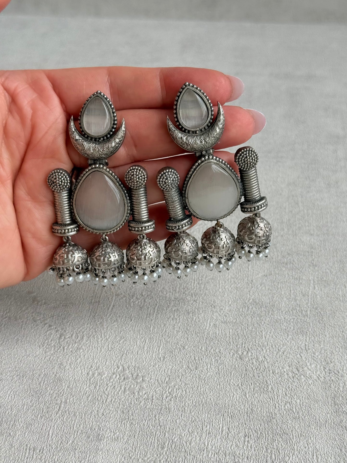 Ayura Designs Qissa Earrings – Oxidised Triple Jhumki Earrings with Opal Grey Stones & Pearl Detailing