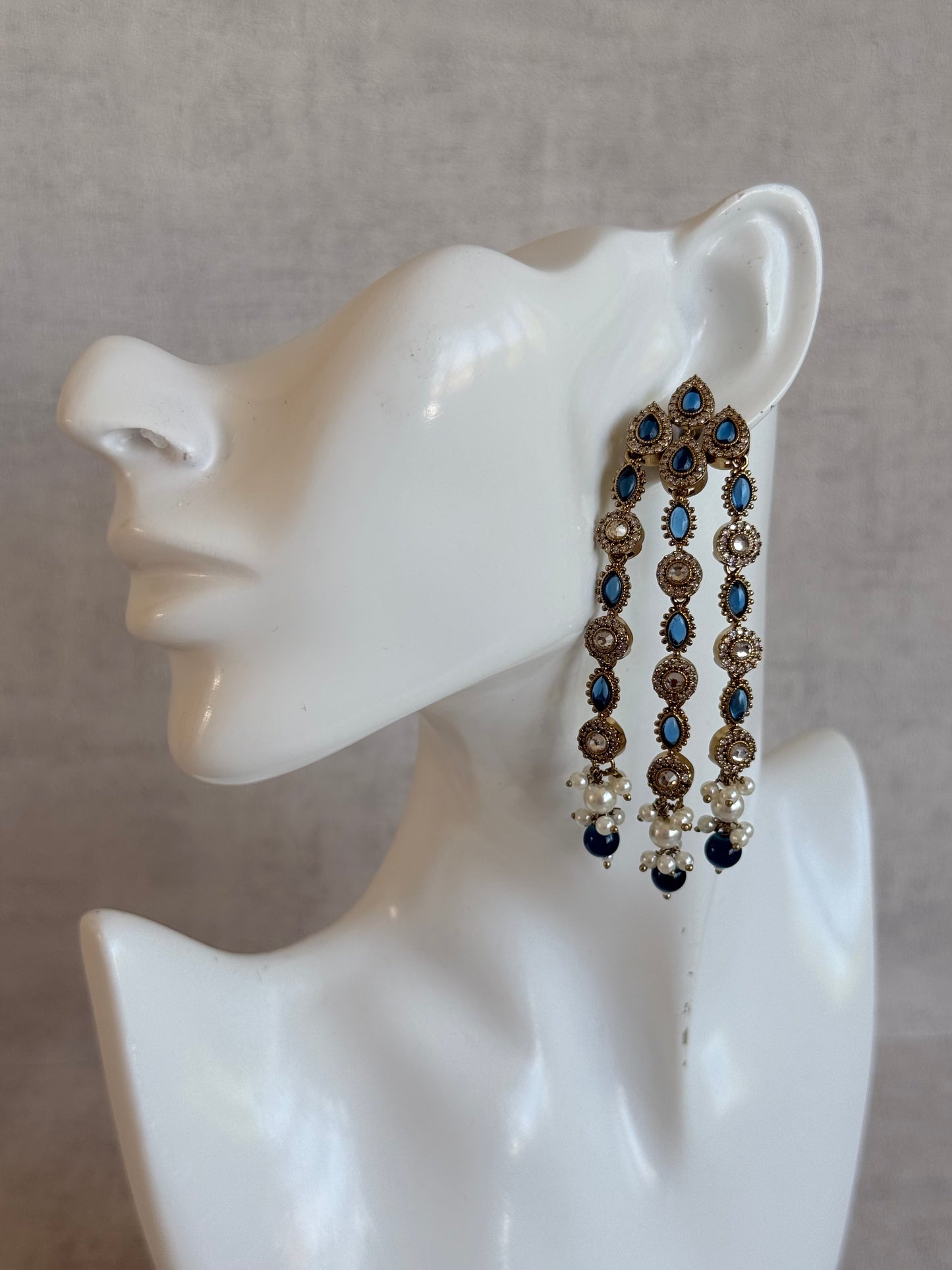 Ayura Designs Emilia Earrings – Gold Triple Strand Statement Earrings with Ink Blue Stones & Pearl Drops