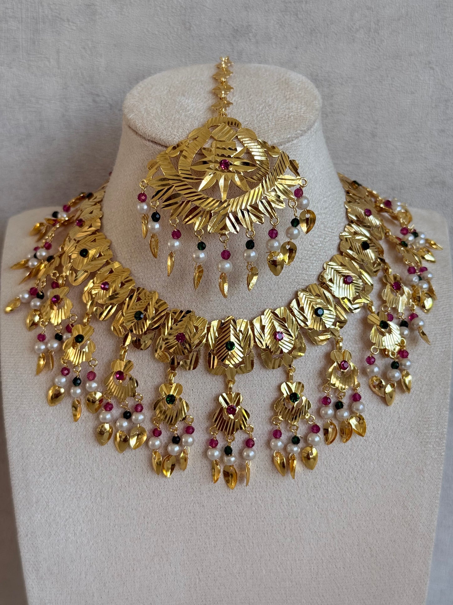 Ayura Designs Baisakhi Set with Earrings & Tikka – Gold Pipal Patti Design with Ruby Pink, Emerald Green & Pearl Detailing