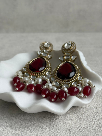 Ayura Designs Nageen Earrings – Antique Gold Jhumkis with Ruby Red Stones, Mirror-Cut Accents & Pearl Drops