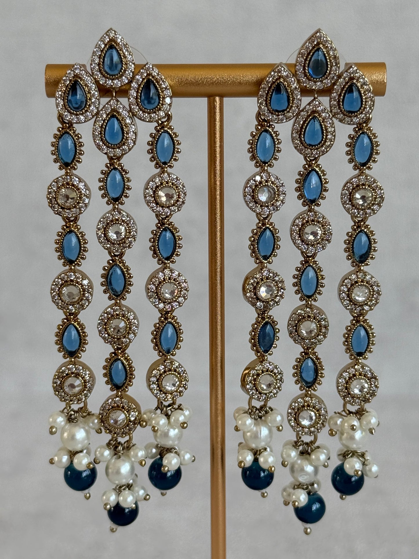 Ayura Designs Emilia Earrings – Gold Triple Strand Statement Earrings with Ink Blue Stones & Pearl Drops