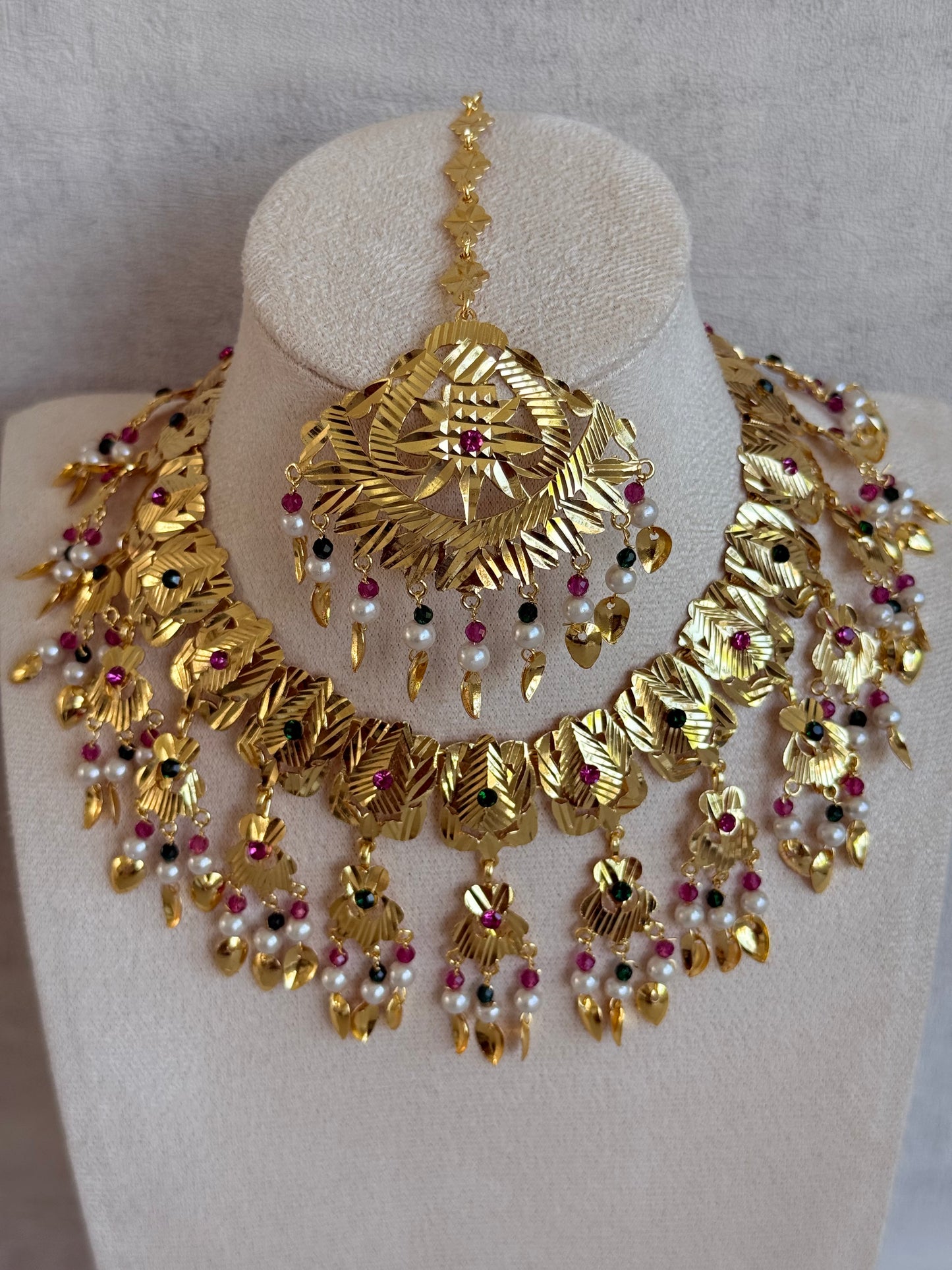 Ayura Designs Baisakhi Set with Earrings & Tikka – Gold Pipal Patti Design with Ruby Pink, Emerald Green & Pearl Detailing