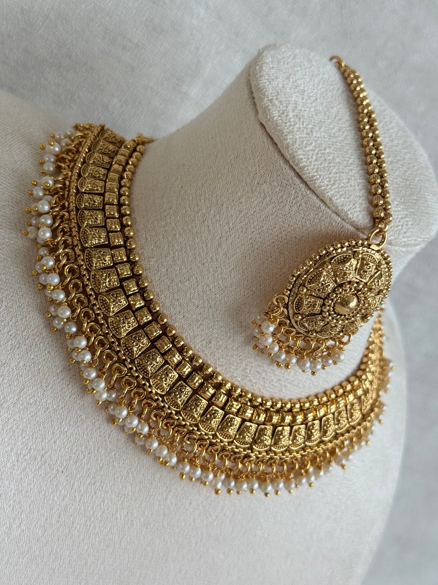 Ayura Designs Iksirat Necklace Set with Jhumkis & Tikka – Gold Heritage Design with Pearl Detailing