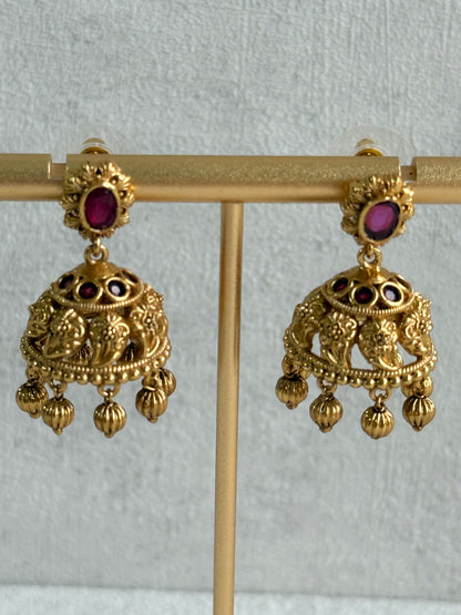 Ayura Designs Savya Jhumkis – Rani Pink Stones, Floral Motifs & Antique Gold Finish