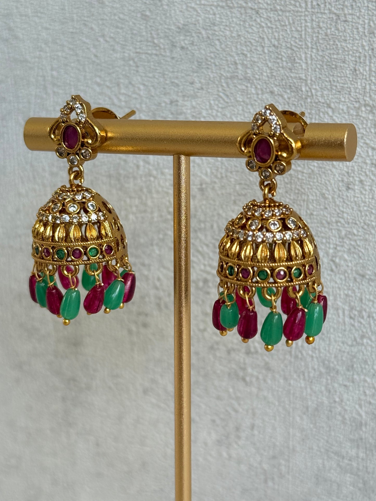 Ayura Designs Devi Jhumkis – Ruby Pink & Green Stones with Clear Stone Detailing & Gold Finish