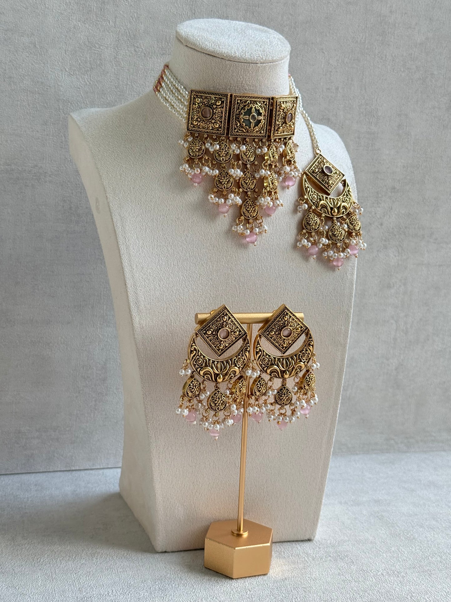 Ayura Designs Samera Choker Set with Earrings & Tikka – Blush Pink Beads, Pearl Detailing, Green Centre Stone, Floral Motifs & Antique Gold Finish