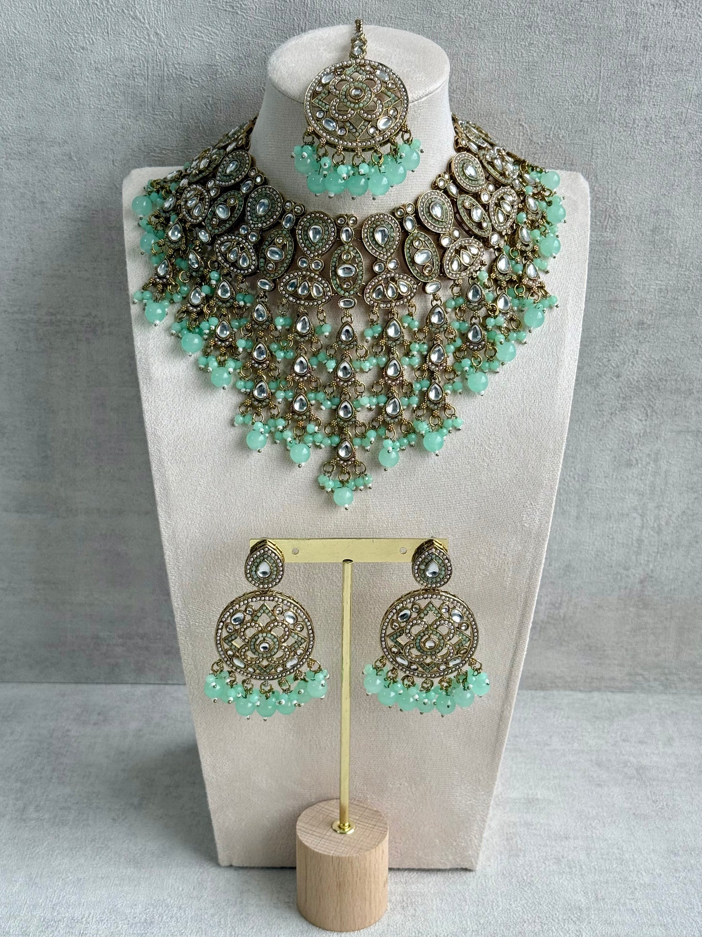 Ayura is Designs Tanya Bridal Set with Necklace, Earrings & Tikka – Pistachio Mint Beads, Mirror-Cut Stones and Antique Gold Finish